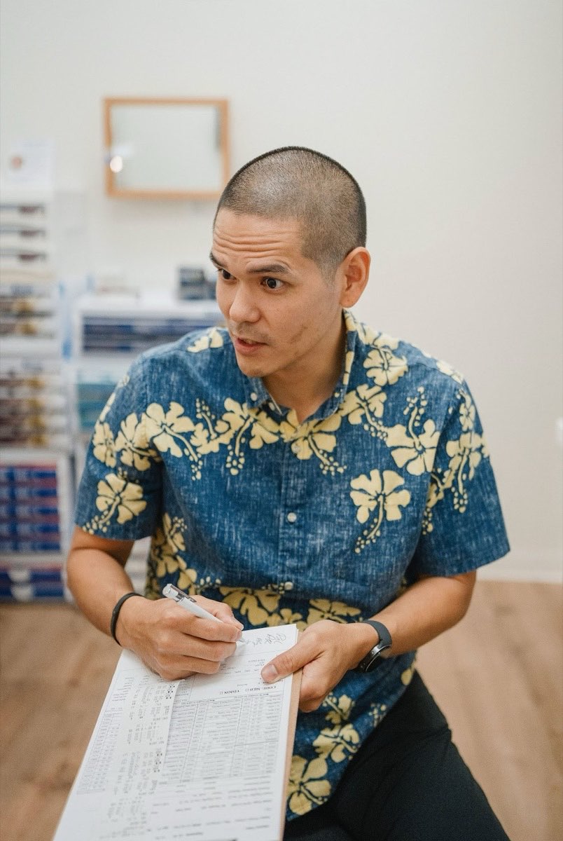 Dr. James “Jimmy” Miyasaka explaining exam findings to a patient